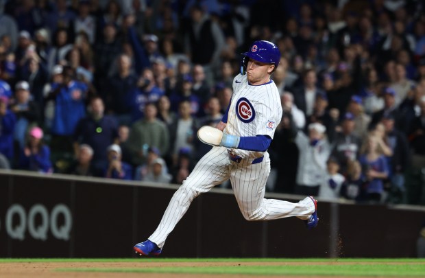 Cubs center fielder Pete Crow-Armstrong rounds the bases on a single from right fielder Seiya Suzuki in the sixth inning against the Marlins at Wrigley Field on Sept. 22, 2026, in Chicago. (John J. Kim/Chicago Tribune)
