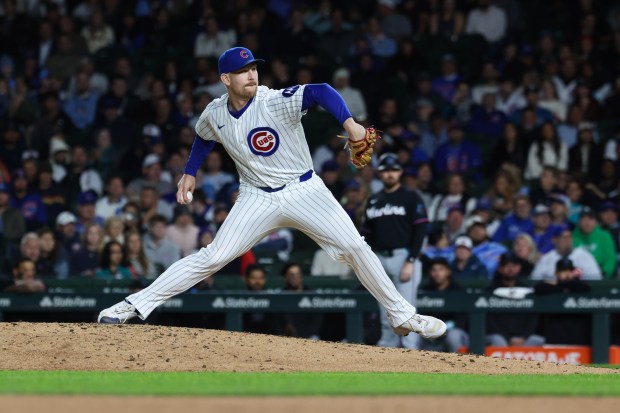 Cubs pitcher Ryan Zeferjahn throws in the tenth inning against the Marlins at Wrigley Field on Sept. 22, 2026, in Chicago. (John J. Kim/Chicago Tribune)