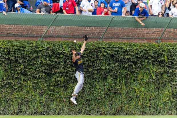 Pittsburgh Pirates left fielder Bryan Reynolds (10) fails to grab a double by Chicago Cubs third baseman Alex Bregman (3) during the sixth inning of a baseball game between the Pittsburgh Pirates and Chicago Cubs at Wrigley Field on Sunday, Sept. 13, 2026. (Arthur Maiorella/Chicago Tribune)