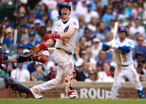 Cubs center fielder Pete Crow-Armstrong yells in pain after he fouls a ball off his foot during the eighth inning against the Cardinals at Wrigley Field on July 5, 2026. (Eileen T. Meslar/Chicago Tribune)