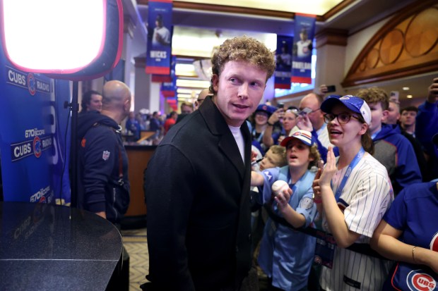 Pete Crow-Armstrong walks by fans as he arrives to walk the blue carpet on the first day of the Cubs Convention at the Sheraton Grand Chicago on Jan. 16, 2026. (Chris Sweda/Chicago Tribune)