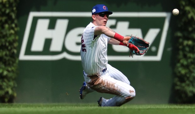 Cubs center fielder Pete Crow-Armstrong makes a sliding catch of a fly ball hit by Giants designated hitter Casey Schmitt in the sixth inning of a game at Wrigley Field on June 6, 2026. (Chris Sweda/Chicago Tribune)