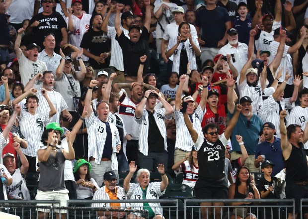Fans cheer in the left field bleachers after a solo home run by Chicago White Sox first baseman Munetaka Murakami in the sixth inning of a game against the Cleveland Guardians at Rate Field in Chicago on Aug. 8, 2026. (Chris Sweda/Chicago Tribune)