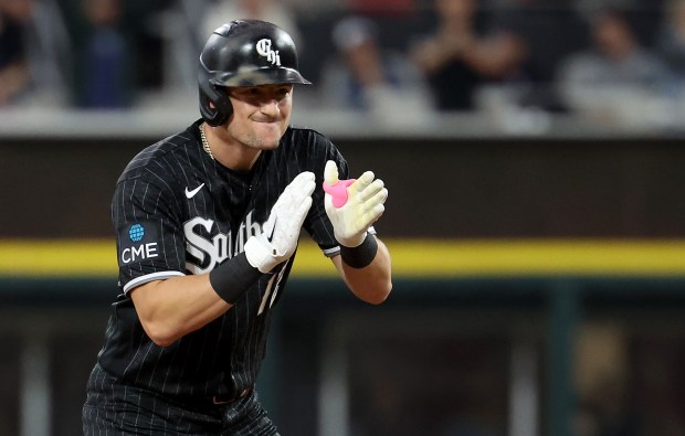White Sox shortstop Colson Montgomery celebrates at second base after hitting a three-run double in the first inning against the Tigers on Sept. 18, 2026, at Rate Field. (Chris Sweda/Chicago Tribune)