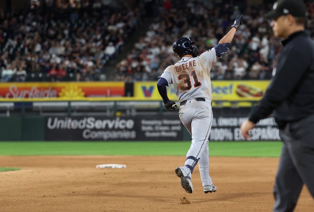 Tigers left fielder Riley Greene celebrates as he rounds the bases after hitting a two-run home run in the eighth inning against the White Sox on Sept. 18, 2026, at Rate Field. (Chris Sweda/Chicago Tribune)