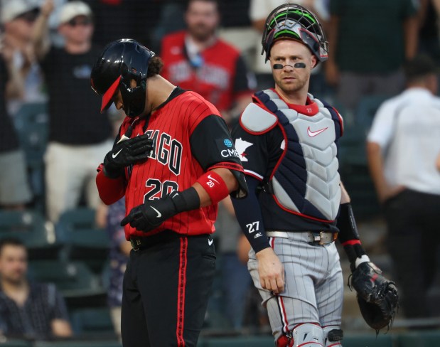 White Sox third baseman Miguel Vargas, left, crosses the plate past Twins catcher Ryan Jeffers after hitting a solo home run in the first inning Friday, Sept. 4, 2026, at Rate Field. (John J. Kim/Chicago Tribune)
