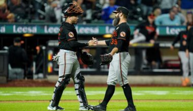 Andrew Kittredge ends a game with Orioles catcher Yohel Pozo.