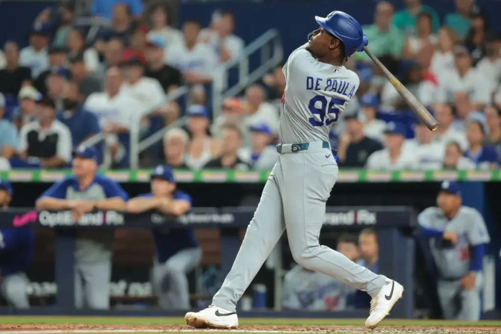 Sep 13, 2026; Miami, Florida, USA; Los Angeles Dodgers left fielder Josue de Paula (95) hits a three-run home run against the Miami Marlins during the fourth inning at loanDepot Park. Mandatory Credit: Sam Navarro-Imagn Images