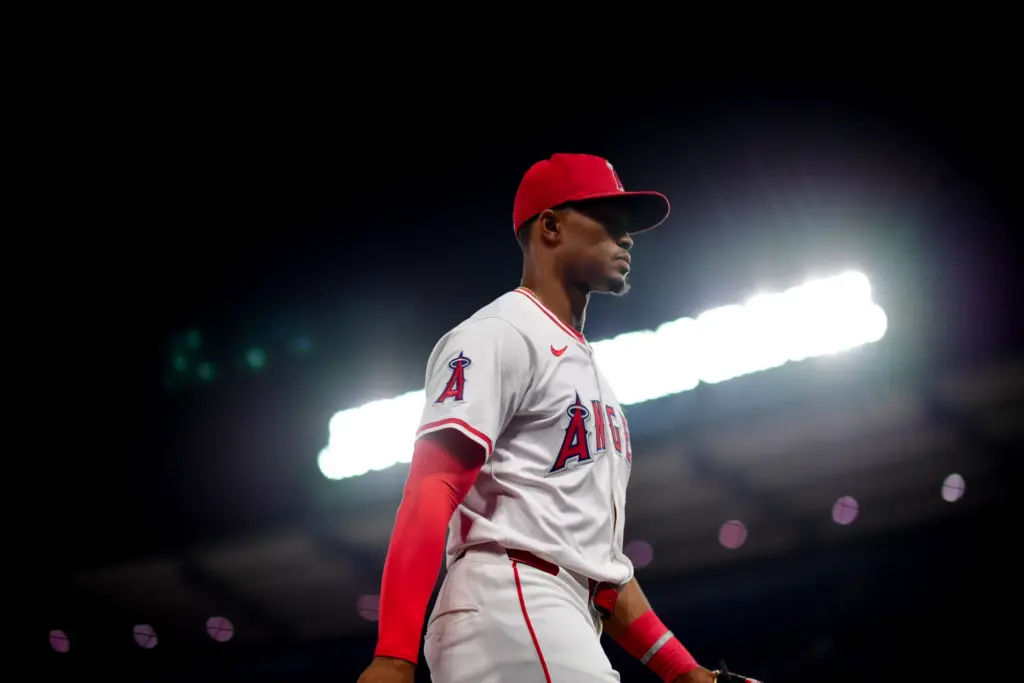 May 24, 2025; Anaheim, California, USA; Los Angeles Angels center fielder Kyren Paris (19) returns to the dugout following the top of the ninth inning against the Miami Marlins at Angel Stadium. Mandatory Credit: Gary A. Vasquez-Imagn Images