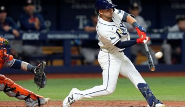 Tampa Bay Rays' Nick Madrigal connects for a run scoring sacrifice fly off Houston Astros pitcher Bennett Sousa during the seventh inning of a baseball game Saturday, Sept. 12, 2026, in St. Petersburg, Fla. (AP Photo/Chris O'Meara)
