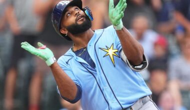 Tampa Bay Rays' Junior Caminero celebrates as he crosses home plate after hitting a two-run home run off Colorado Rockies starting pitcher Michael Lorenzen in the first inning of a baseball game Monday, Aug. 3, 2026, in Denver. (AP Photo/David Zalubowski)