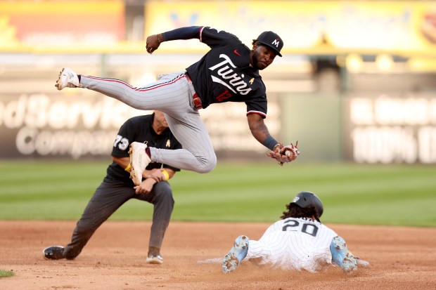 Miguel Vargas of the Chicago White Sox steals second base past Kaelen Culpepper of the Minnesota Twins during the third inning at Rate Field on Sept. 6, 2026, in Chicago. (Geoff Stellfox/Getty Images)