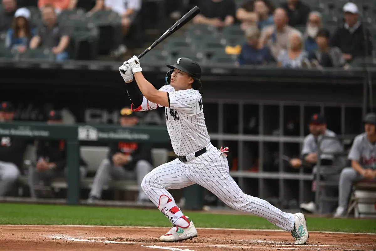 Chicago White Sox's Munetaka Murakami watches his RBI single during the first inning of a baseball game against the Detroit Tigers Saturday, Sept. 19, 2026, in Chicago. (AP Photo/Paul Beaty)