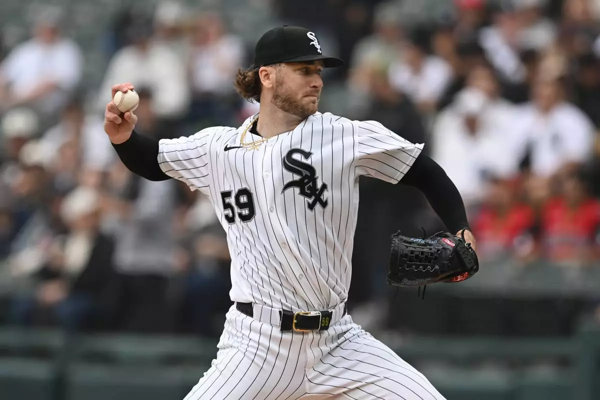 Chicago White Sox starter Sean Burke delivers a pitch during the first inning of a baseball game against the Detroit Tigers Saturday, Sept. 19, 2026, in Chicago. (AP Photo/Paul Beaty)