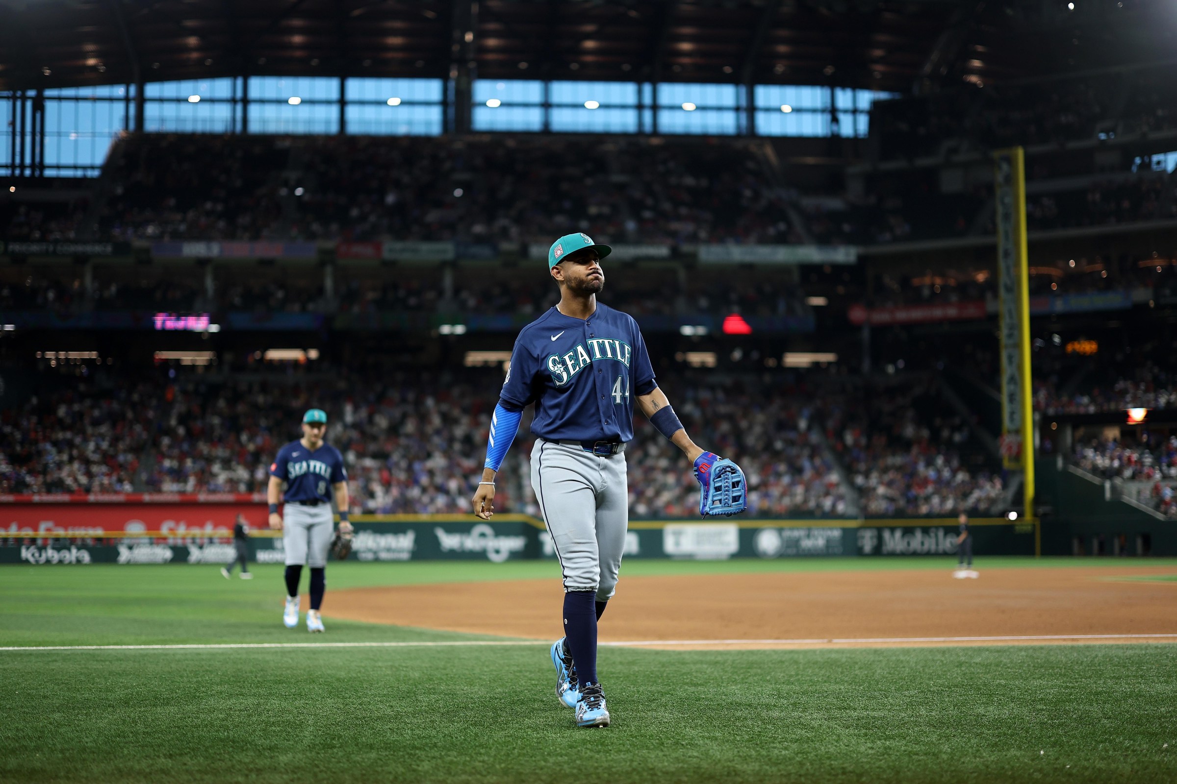 ARLINGTON, TEXAS - JULY 24: Julio Rodríguez #44 of the Seattle Mariners walks to the dugout during the fourth inning against the Texas Rangers at Globe Life Field on July 24, 2026 in Arlington, Texas. (Photo by Stacy Revere/Getty Images)