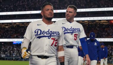 Aug 14, 2026; Los Angeles, California, USA; Los Angeles Dodgers second baseman Miguel Rojas (72) and first baseman Freddie Freeman (5) react after the game against the Milwaukee Brewers at Dodger Stadium. Mandatory Credit: Kirby Lee-Imagn Images