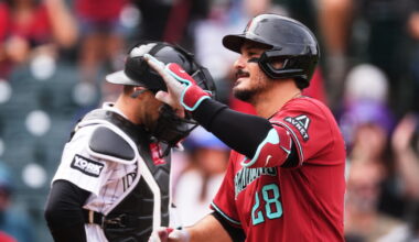 Nolan Arenado hit a home run as the D-Backs beat the Rockies 12-8