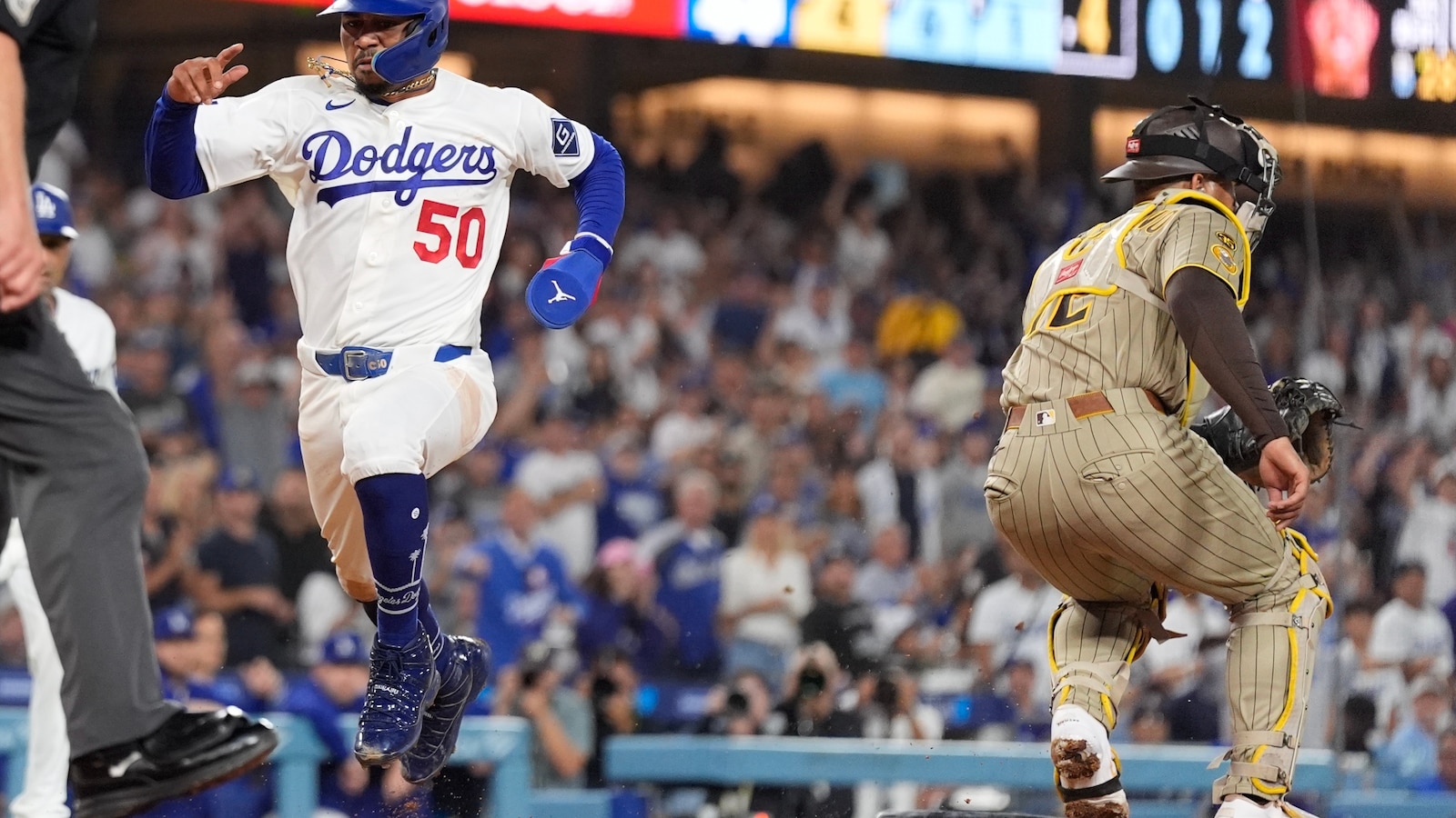 Dodgers score 5 two-out runs off Padres starter Michael King in 7-0 victory