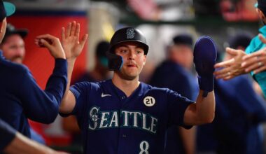 Sep 15, 2026; Anaheim, California, USA; Seattle Mariners designated hitter Dominic Canzone (8) is greeted after hitting an RBI double against the Los Angeles Angels during the sixth inning at Angel Stadium. Mandatory Credit: Gary A. Vasquez-Imagn Images