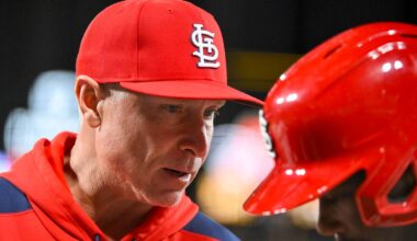 Apr 1, 2025; St. Louis, Missouri, USA;  St. Louis Cardinals hitting coach Brant Brown (73) talks with right fielder Jordan Walker (18) before an at bat against the Los Angeles Angels during the tenth inning at Busch Stadium. Mandatory Credit: Jeff Curry-Imagn Images