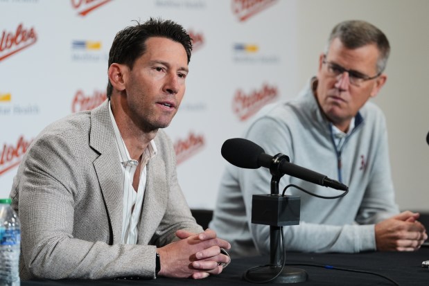 Boston Red Sox chief baseball officer Craig Breslow, left, speaks during a press conference alongside team president and CEO Sam Kennedy, Sunday, April 26, 2026, in Baltimore. (AP Photo/Stephanie Scarbrough)