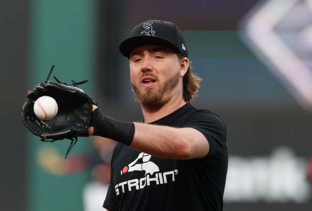 White Sox second baseman Chase Meidroth warms up for Game 1 of the AL Division Series against the Guardians on Oct. 3 in Cleveland. (John J. Kim/Chicago Tribune)