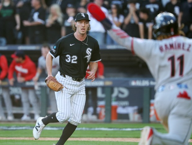 White Sox pitcher Hagen Smith watches at Cleveland third baseman José Ramírez comes around third base to score in the third inning of Game 3 of their AL Division Series on Oct. 7, 2026, at Rate Field. (Chris Sweda/Chicago Tribune)
