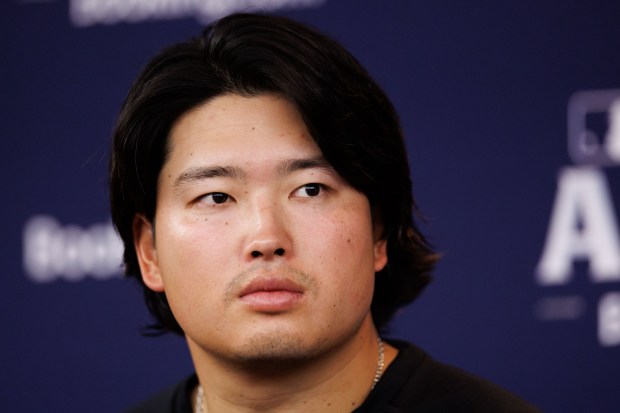 White Sox first baseman Munetaka Murakami talks with members of the press before a workout at Rate Field on Tuesday, Oct. 6, 2026, in Chicago. The White Sox face the Guardians in Game 3 of the ALDS on Wednesday. (Armando L. Sanchez/Chicago Tribune)
