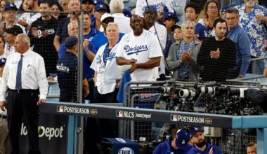 Magic Johnson’s business ties to Mark Walter face scrutiny amid reported $2 billion in loans