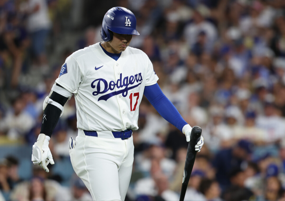 Oct 4, 2026; Los Angeles, California, USA; Los Angeles Dodgers designated hitter Shohei Ohtani (17) reacts after striking out during the seventh inning against the Atlanta Braves in game two of the NLDS for the 2026 MLB Playoffs at Uniqlo Field at Dodger Stadium. Mandatory Credit: Kiyoshi Mio-Imagn Images