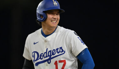 Sep 10, 2025; Los Angeles, California, USA; Los Angeles Dodgers designated hitter Shohei Ohtani (17) smiles after he was awarded first base on catcher interference during the eighth inning against the Colorado Rockies at Dodger Stadium. Mandatory Credit: Jayne Kamin-Oncea-Imagn Images