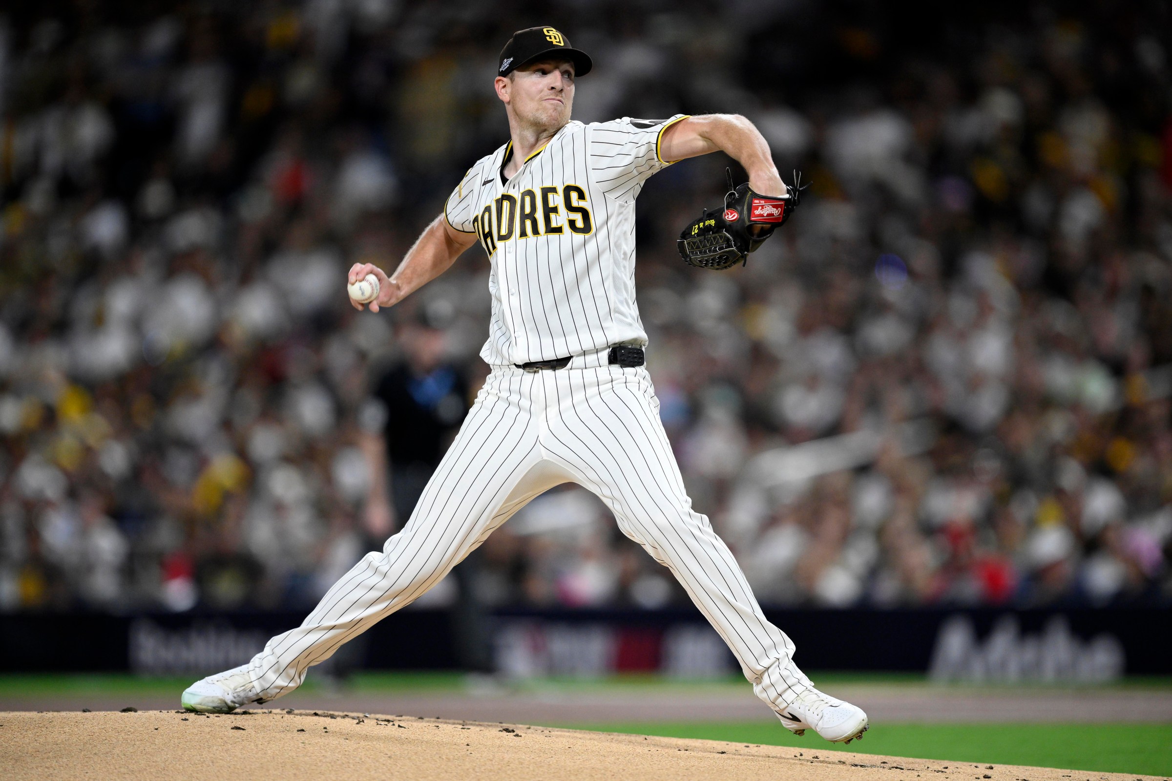SAN DIEGO, CALIFORNIA - OCTOBER 06: Nick Pivetta #27 of the San Diego Padres pitches in the first inning against the Milwaukee Brewers in game three of the National League Division Series at Petco Park on October 06, 2026 in San Diego, California. (Photo by Orlando Ramirez/Getty Images)