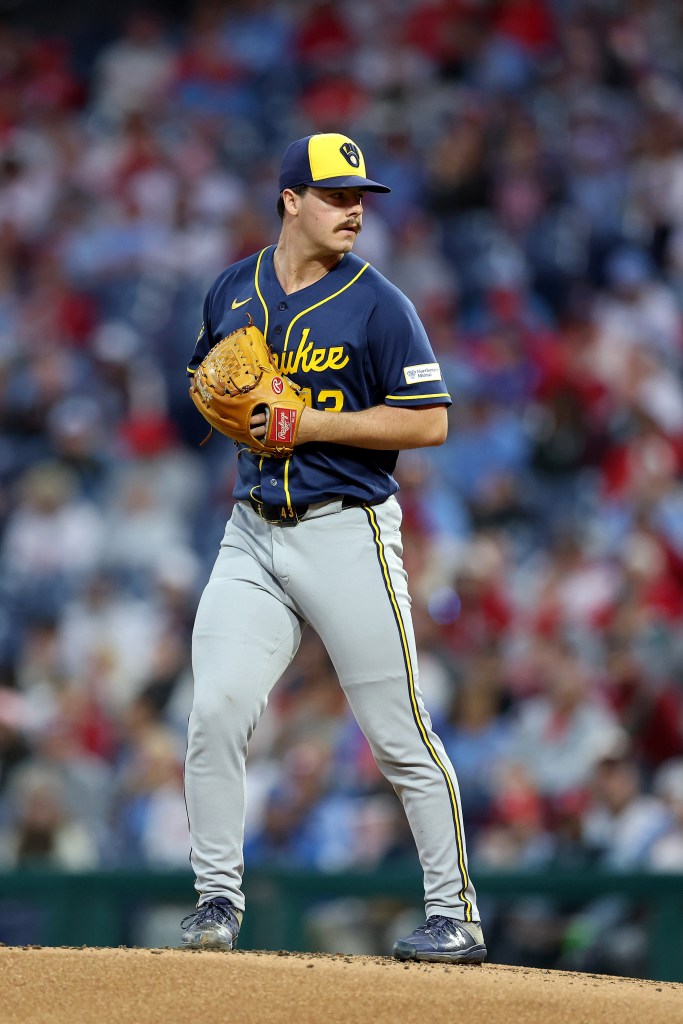 Logan Henderson of the Milwaukee Brewers pitches during a game against the Philadelphia Phillies.