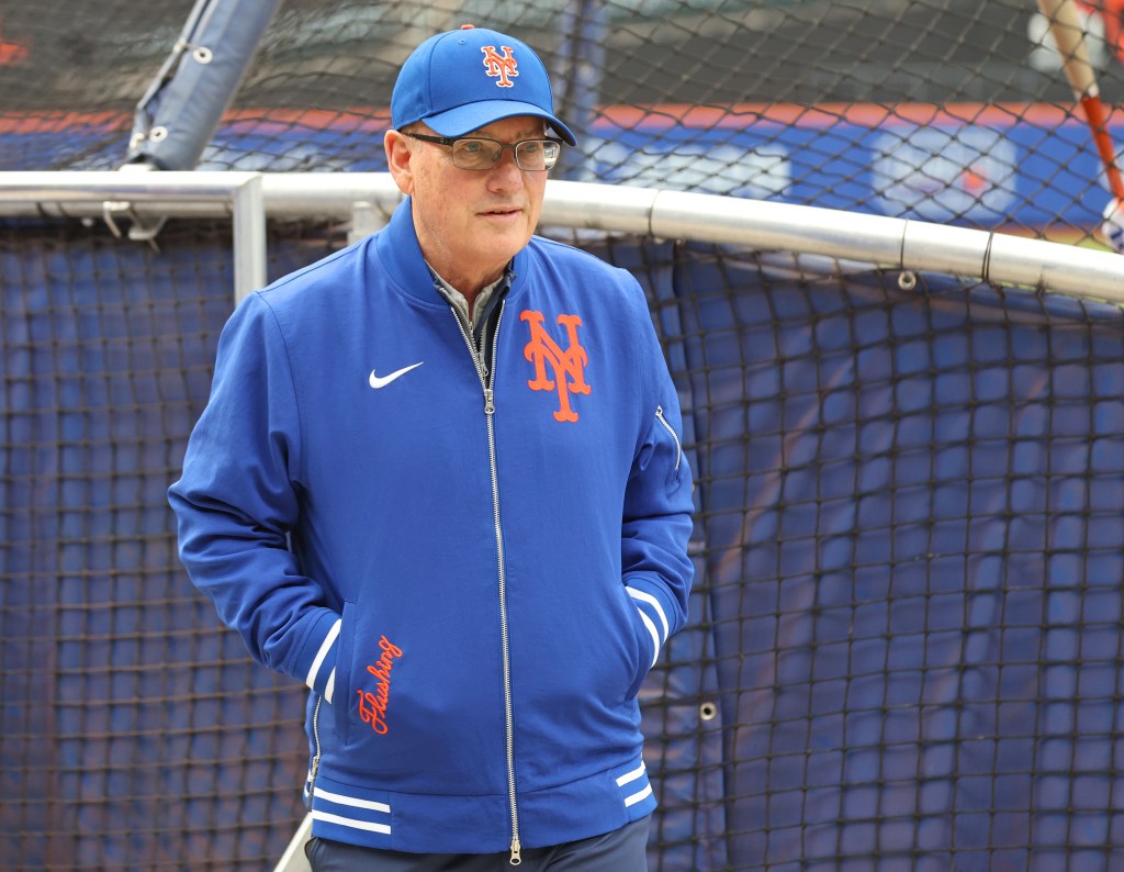 New York Mets owner Steve Cohen stands on the field at Citi Field in Queens.