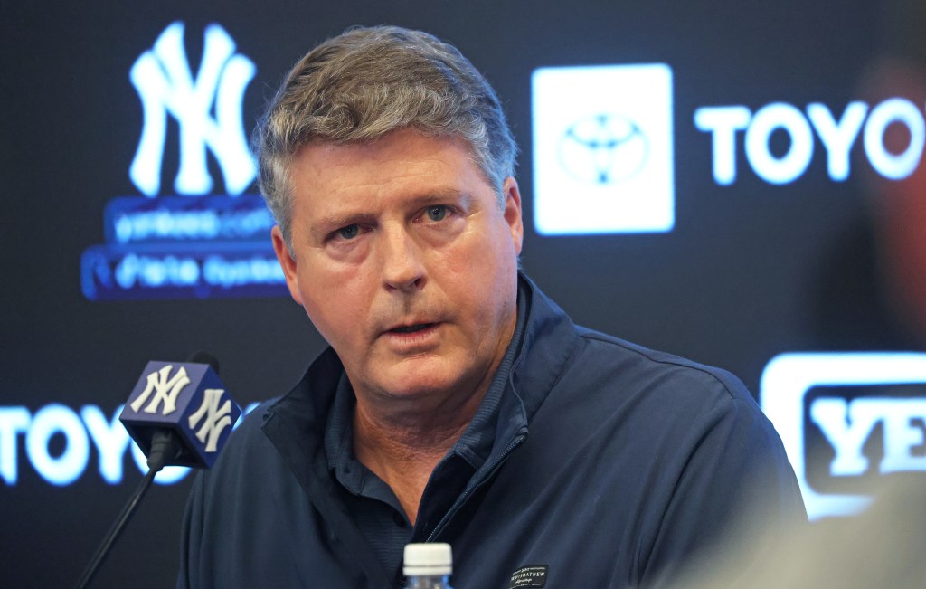 New York Yankees co-owner Hal Steinbrenner speaks at a press conference announcing a change to the team's facial hair policy.