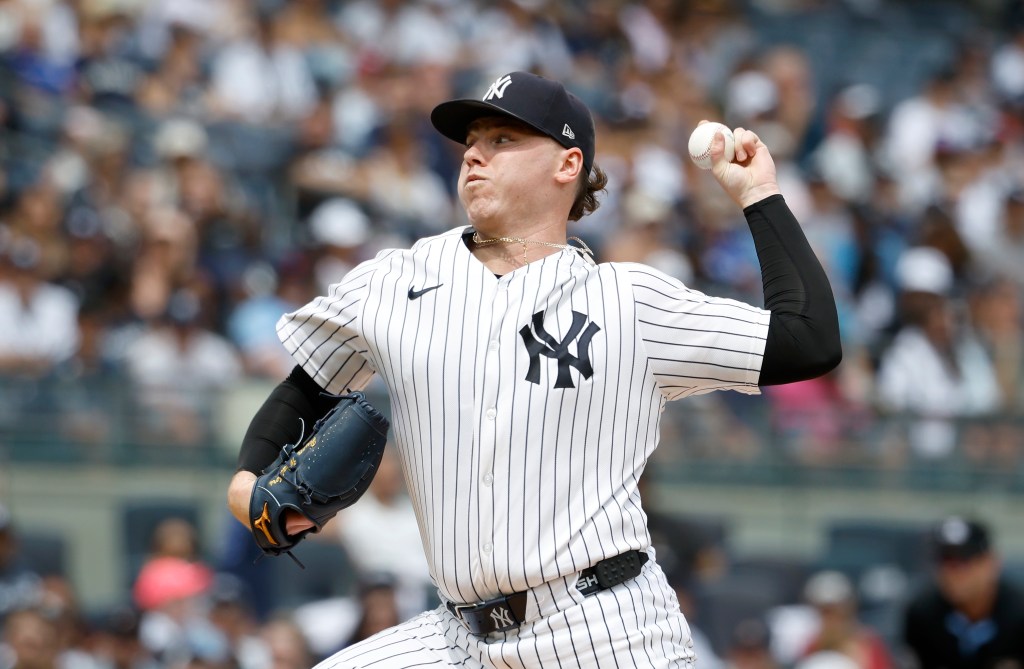 New York Yankees pitcher Ryan Weathers throws a pitch during a game against the Toronto Blue Jays at Yankee Stadium.