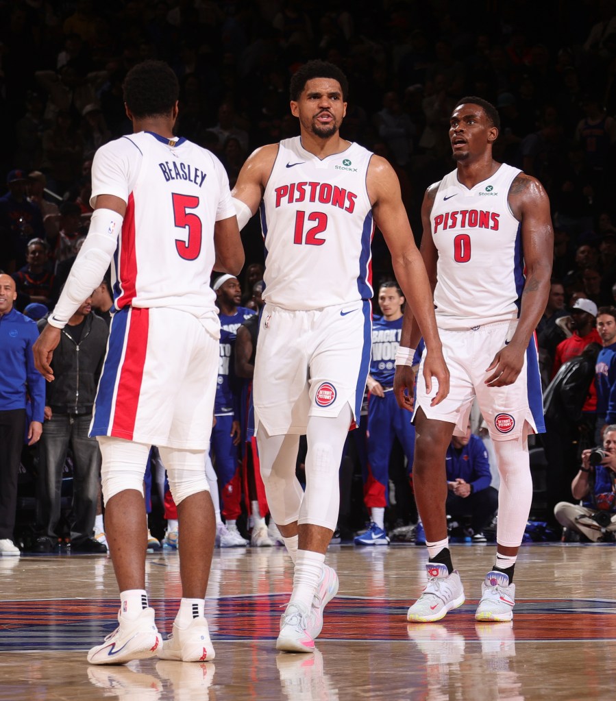Tobias Harris #12 and Malik Beasley #5 of the Detroit Pistons high five during Game 2 against the Knicks.