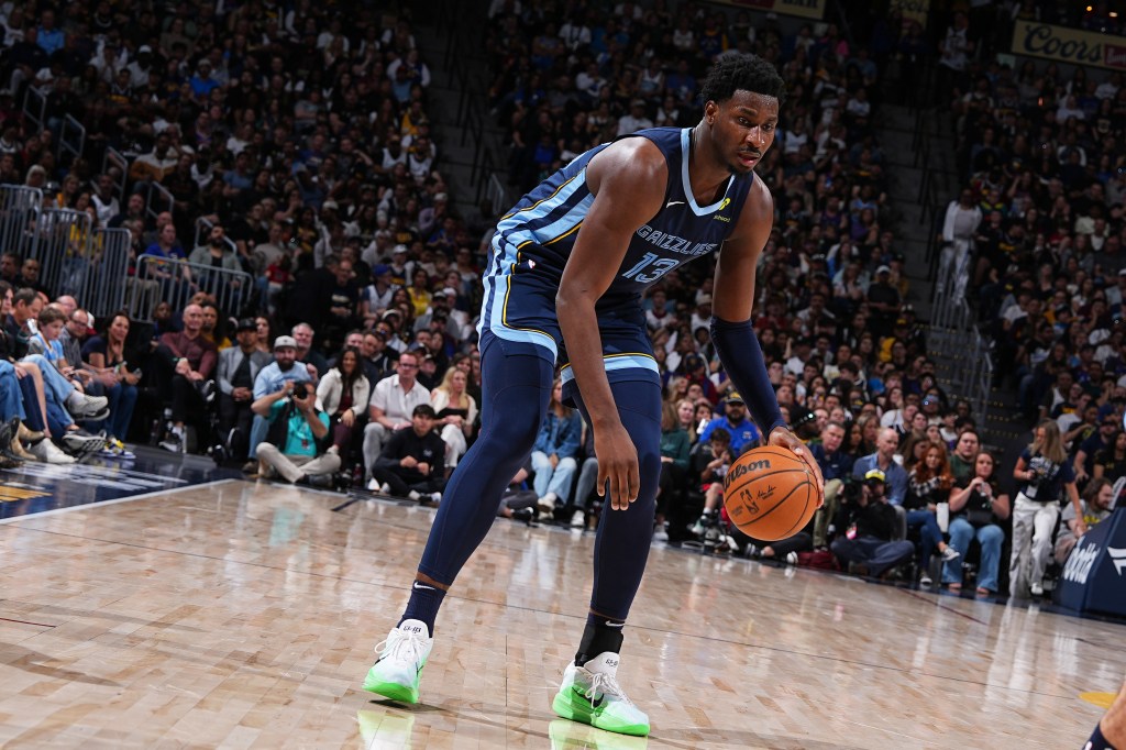 Jaren Jackson Jr. #13 of the Memphis Grizzlies dribbles the ball during the game against the Denver Nuggets on April 11, 2025 at Ball Arena in Denver, Colorado.