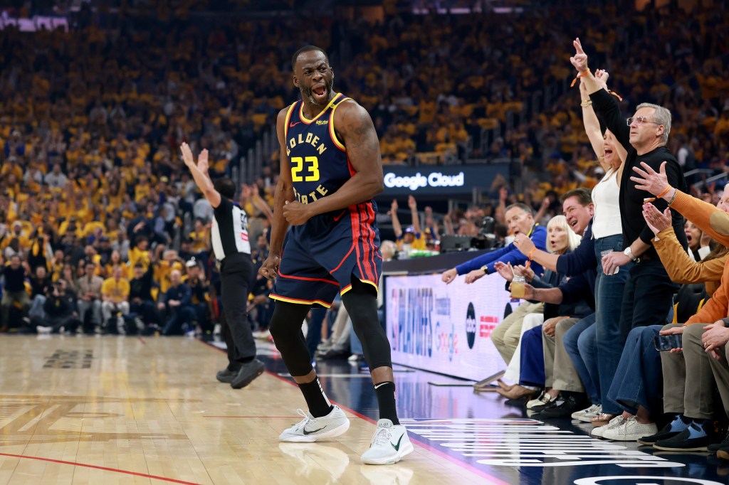 Draymond Green #23 of the Golden State Warriors celebrates a three point basket against the Houston Rockets during the first quarter in Game Four of the Western Conference First Round NBA Playoffs at Chase Center on April 28, 2025 in San Francisco, California.