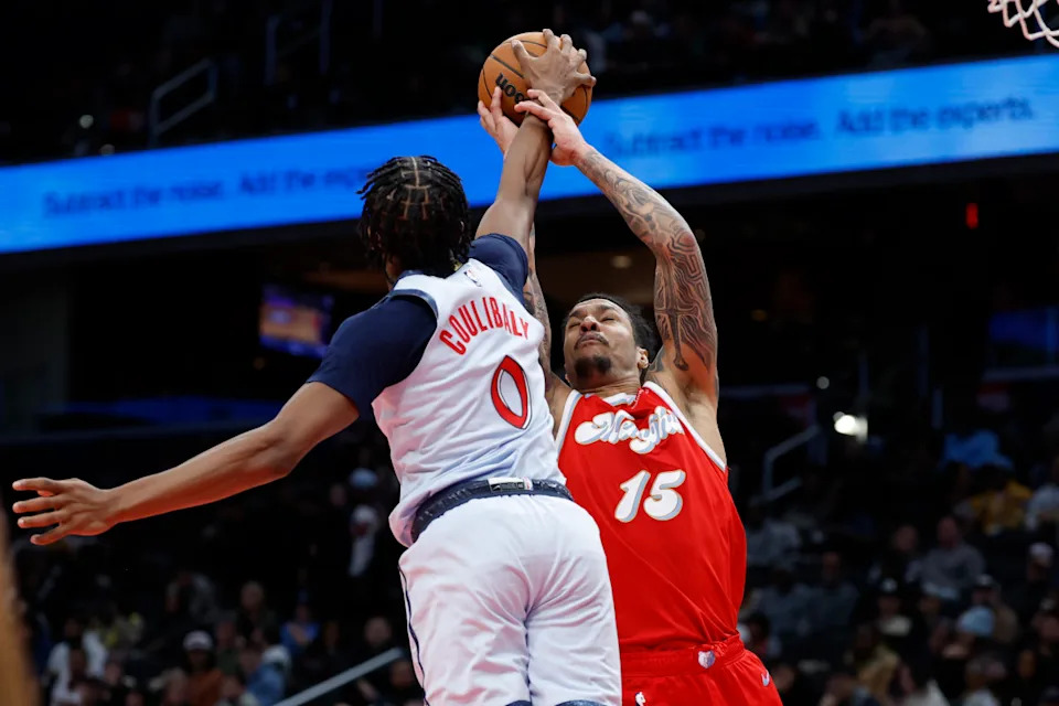 Washington Wizards guard Bilal Coulibaly (0) blocks the shot of Memphis Grizzlies forward Brandon Clarke (15) in the fourth quarter at Capital One Arena.Geoff Burke-Imagn Images