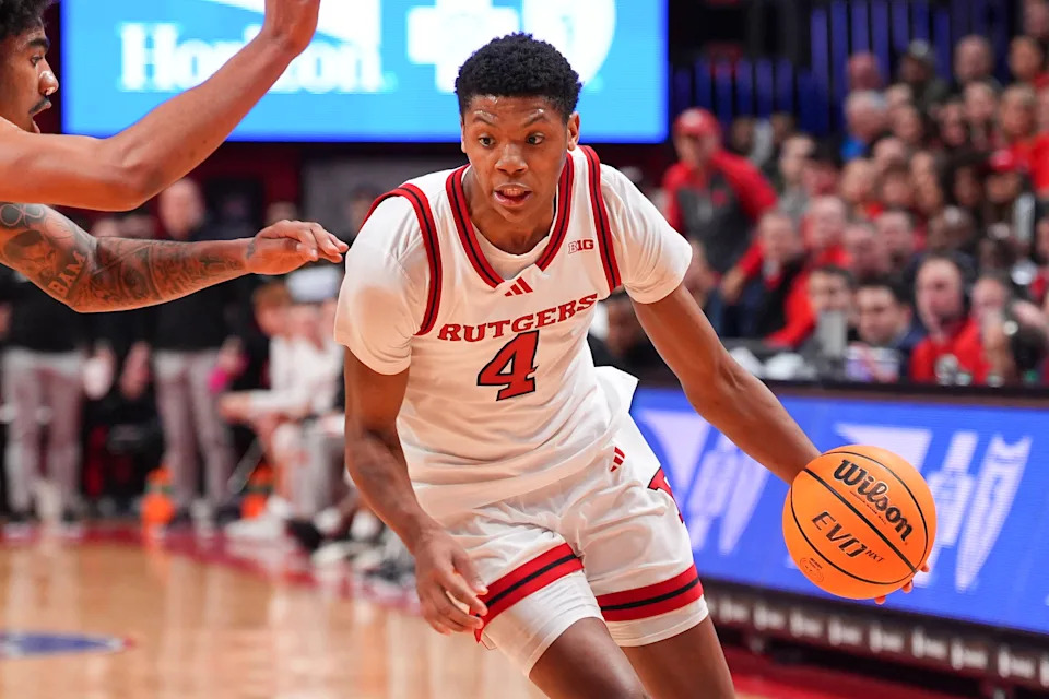 PISCATAWAY, NJ - FEBRUARY 23:  Ace Bailey #4 of the Rutgers Scarlet Knights controls the ball during the first  half of the game against the USC Trojans on February 23, 2025 at Jersey Mikes Arena in Piscataway, New Jersey.  (Photo by Rich Graessle/Icon Sportswire via Getty Images)