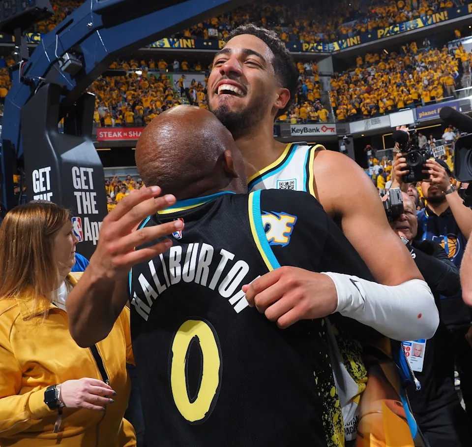 Tyrese Haliburton celebrates with his father. NBAE via Getty Images