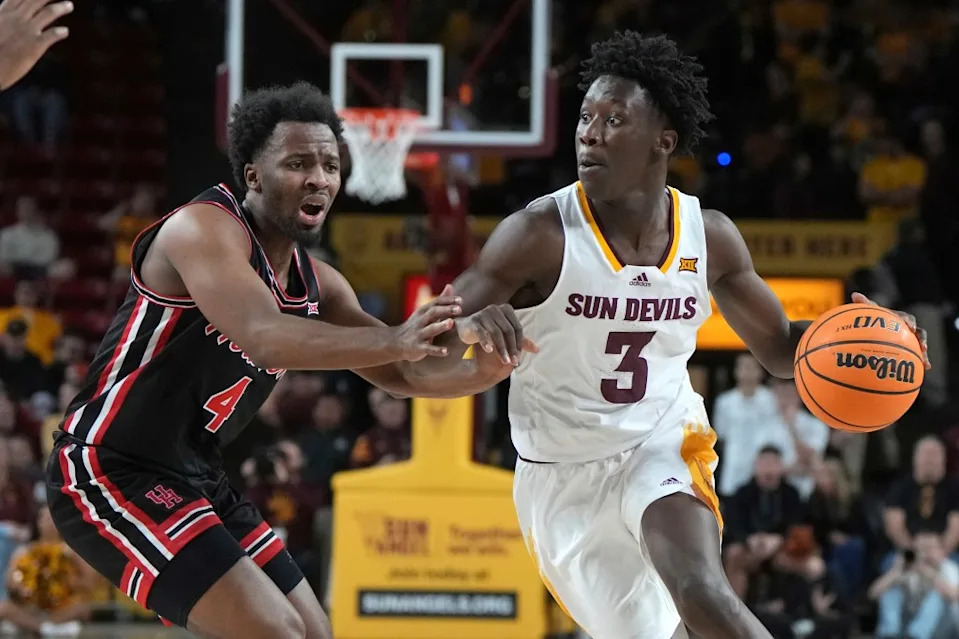 Arizona State guard Joson Sanon drives on L.J. Cryer during the second half of Arizona State’s loss to Houston on Feb. 18, 2025, in Tempe, Ariz. AP
