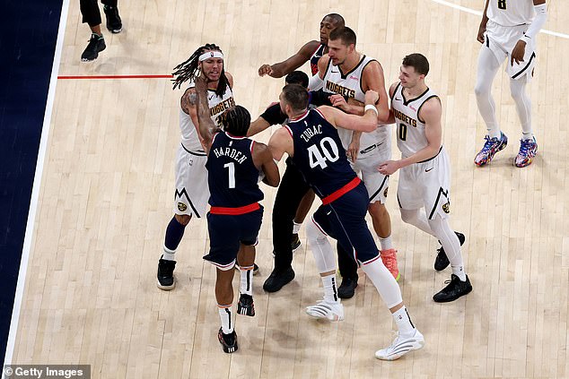 James Harden #1 and Ivica Zubac #40 of the LA Clippers get into a skirmish with Aaron Gordon #32 of the Denver Nuggets, Nikola Jokic #15, and Christian Braun #0 of the Denver Nuggets