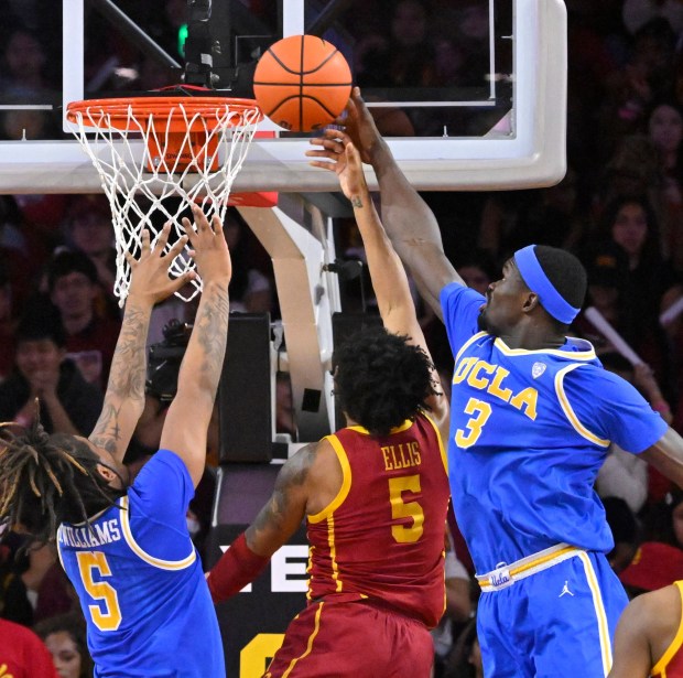Adem Bona (3) of the UCLA Bruins blocks the shot by Boogie Ellis (5) of the USC Trojans in the first half of a Men's NCAA basketball game at the Galen Center in Los Angeles on Saturday, Jan. 27, 2024. (Photo by Keith Birmingham, Pasadena Star-News/ SCNG)