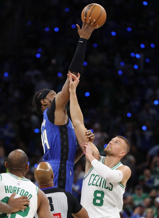 Orlando center Wendell Carter Jr. (34) and Boston center Kristaps...
