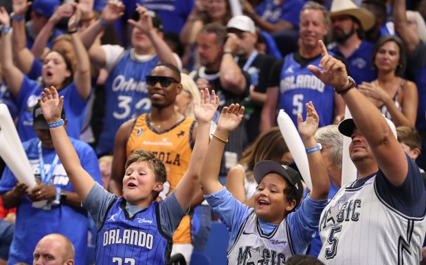 Orlando fans cheer during the Boston Celtics at Orlando Magic...