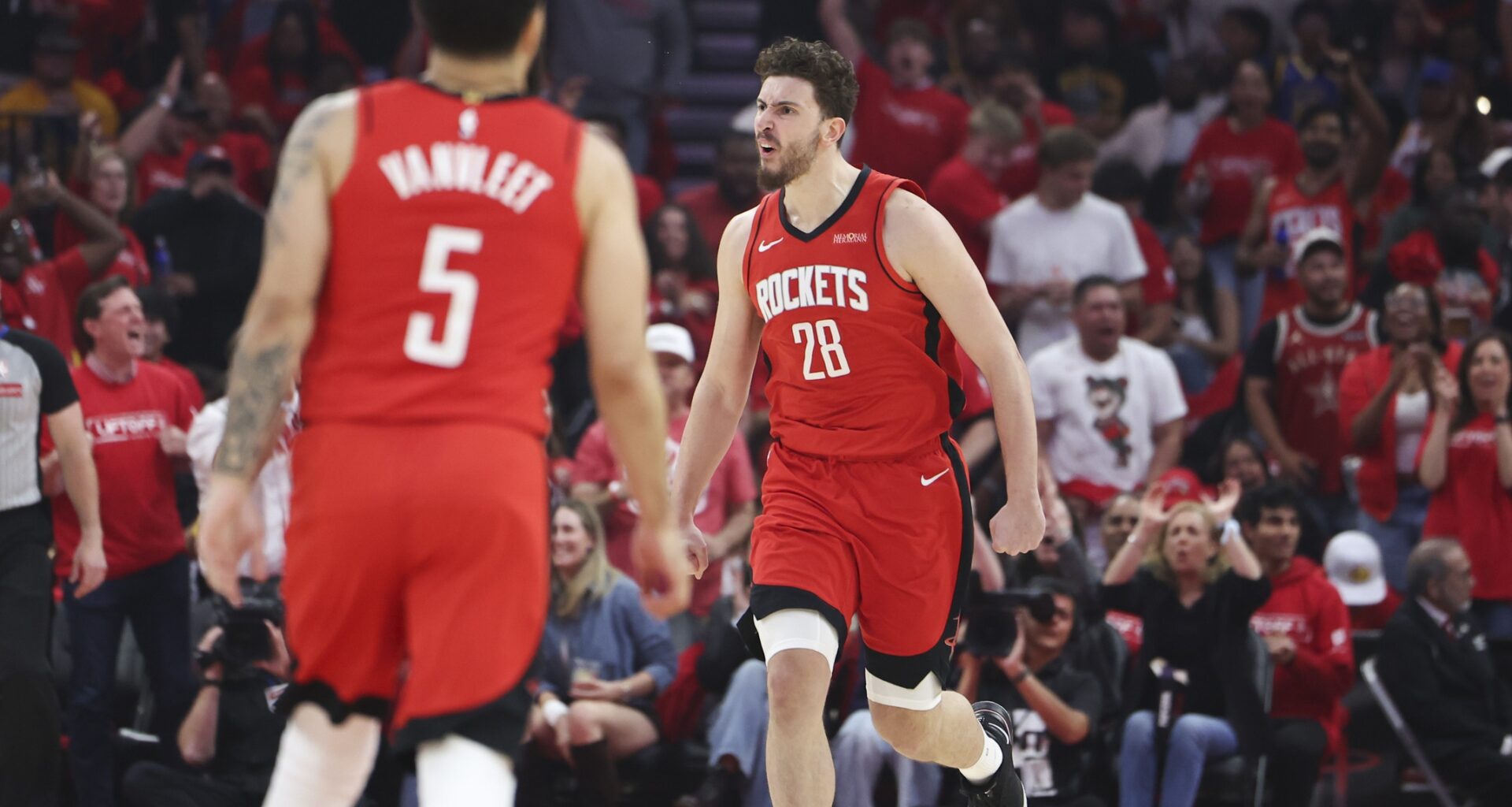 Rockets big man Alperen Sengun celebrates a basket against the Warriors during the 2024-25 NBA season.