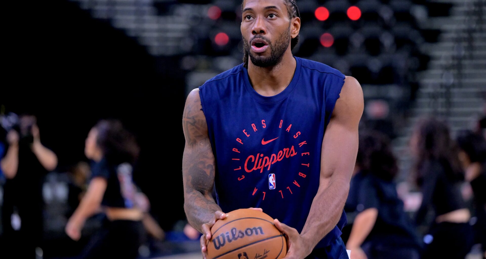 Clippers forward Kawhi Leonard warms up against the Nuggets during the 2024-25 NBA Playoffs.