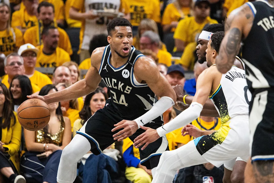 Milwaukee Bucks forward Giannis Antetokounmpo dribbles the ball while Indiana Pacers forward Jarace Walker defends during game five of the first round for the 2024 NBA Playoffs at Gainbridge Fieldhouse.Trevor Ruszkowski-Imagn Images